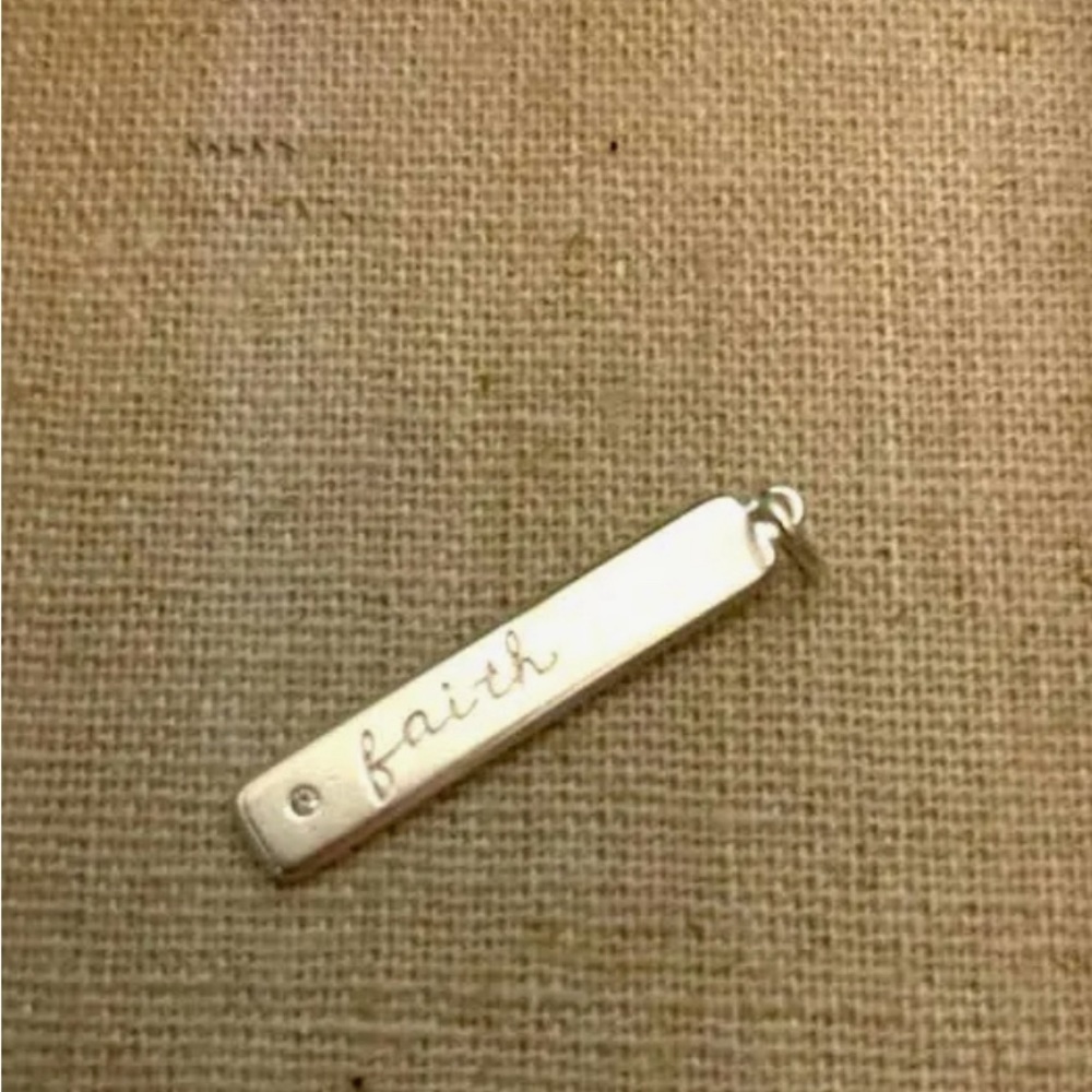 Stella and Dot Faith charm in sterling silver